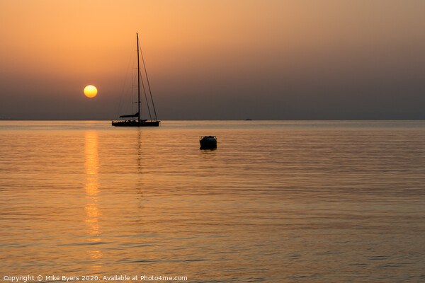 Serene Reflections at Mallorca Sunrise Picture Board by Mike Byers
