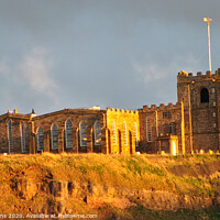 Buy canvas prints of St Mary's Church Whitby in the Golden Sunset light by Fiona Williams