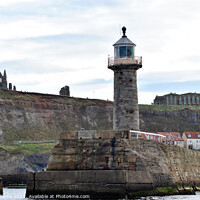 Buy canvas prints of Whitby Abbey St Mary's Church and the lighthouse f by Fiona Williams