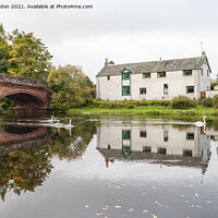 Buy canvas prints of Swans Glide by Callander Bridge River Teith - Scotland by Iain Gordon