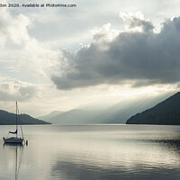 Buy canvas prints of Solitary Boat on a tranquil Loch Tay Perthshire Scotland by Iain Gordon