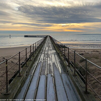 Buy canvas prints of A pier heading out to sea by Iain Cridland