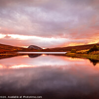 Buy canvas prints of Sunrise over a loch by Iain Cridland