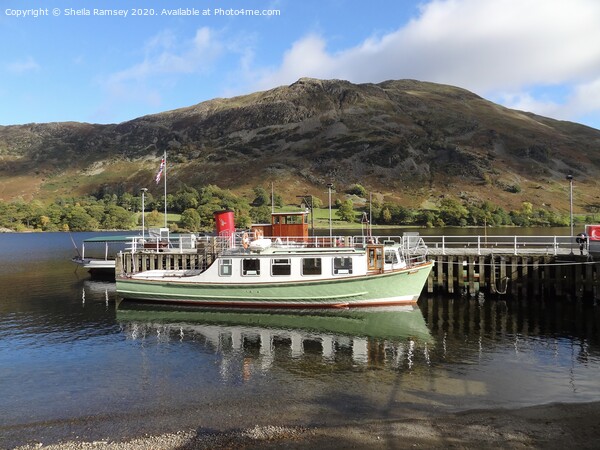 Boats at the jetty Ullswater Lake District  Picture Board by Sheila Ramsey