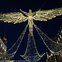 Buy canvas prints of Outdoor Angel Oxford Street London by Stephen Hollin