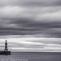 Buy canvas prints of Moody skies over Roker Lighthouse by Stephen Bailey