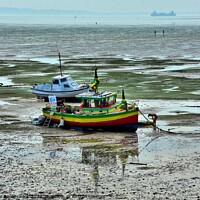Buy canvas prints of Boat at sea at low tide by Adrianna Bielobradek