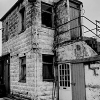 Buy canvas prints of Black & White Dilapidated Guard House, Newlyn Harb by Rika Hodgson