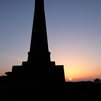 Buy canvas prints of Spring Sunset, Basset Monument Silhouette, Carn Br by Rika Hodgson