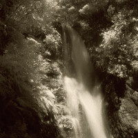 Buy canvas prints of Te Wairoa Waterfall in infrared by Robert MacDowall
