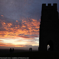 Buy canvas prints of Sunset behind St Michael's Tower on Glastonbury Tor by Robert MacDowall