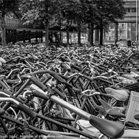 Buy canvas prints of Amsterdam bicycles by Kev Robertson