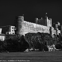 Buy canvas prints of Iconic Bamburgh Castle by Janet Carmichael