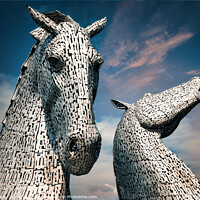 Buy canvas prints of Majestic Kelpies Rising from Scottish Canal by Janet Carmichael