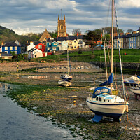 Buy canvas prints of Golden Sunset in Historic Welsh Coastal Town by Janet Carmichael