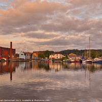 Buy canvas prints of Serene Sunrise over Baltic Wharf by Janet Carmichael
