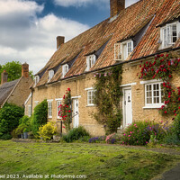 Buy canvas prints of Chocolate Box Charm in Wadenhoe by Janet Carmichael
