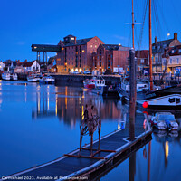 Buy canvas prints of Wells Next the Sea at Night by Janet Carmichael