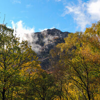 Buy canvas prints of Castle Crag Creating Clouds - Lake District by Janet Carmichael