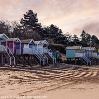Buy canvas prints of Gentle Sunset Over Wells Next The Sea Beach Huts by Janet Carmichael