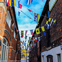 Buy canvas prints of Outdoor street with flags  by Julia Janusz