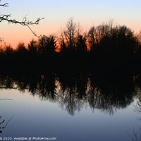 Buy canvas prints of Red sky over Cotswold lake by Ollie Hully