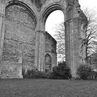 Buy canvas prints of Malmesbury abbey ruins  by Ollie Hully