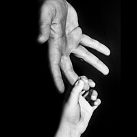 Buy canvas prints of Son and Father's hands reaching for each other by Ollie Hully
