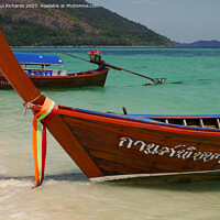 Buy canvas prints of Thai boats on islands by Paul Richards