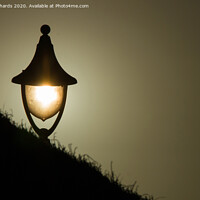 Buy canvas prints of Lamplight at sunset by Paul Richards