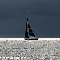 Buy canvas prints of Sailing past the storm. Folkestone.  by MARTIN WOOD