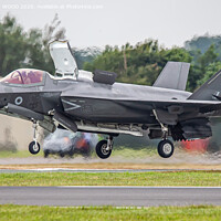 Buy canvas prints of RAF F-35B lands vertically at the Royal International Air Tattoo  by MARTIN WOOD