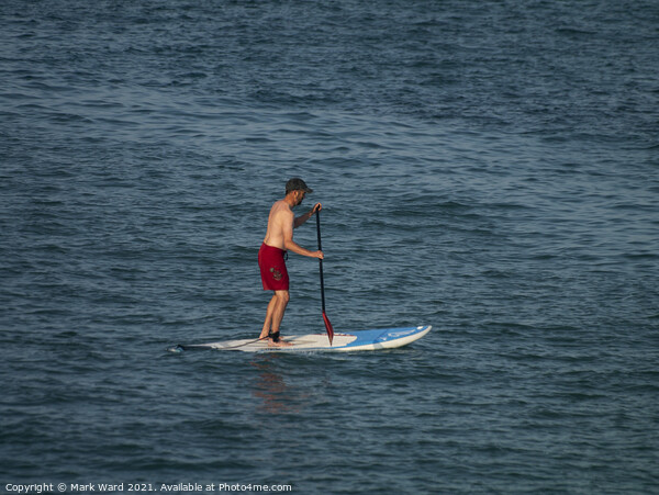 Man On A Paddleboard. Picture Board by Mark Ward