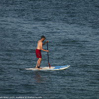 Buy canvas prints of Man On A Paddleboard. by Mark Ward