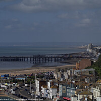 Buy canvas prints of Hastings Pier and Seafront. by Mark Ward