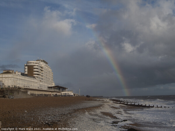 St Leonards Seafront with a Rainbow. Picture Board by Mark Ward