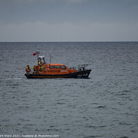 Buy canvas prints of RNLI Lifeboat off the Coast of Hastings. by Mark Ward