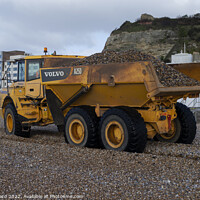 Buy canvas prints of Volvo Dump Truck in Action in Hastings. by Mark Ward