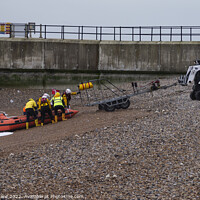Buy canvas prints of Hastings Inshore Lifeboat safely back to base.  by Mark Ward