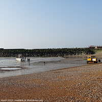 Buy canvas prints of A Hastings fishing boat returning to the shingle beach. by Mark Ward