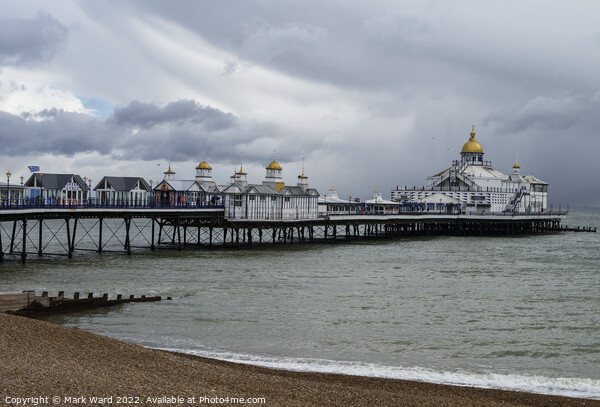 Eastbourne Pier on a cloudy March morning. Picture Board by Mark Ward