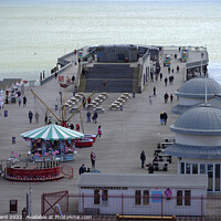Buy canvas prints of Hastings Pier on a cold April day. by Mark Ward