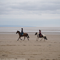 Buy canvas prints of Horseriding on Berrow Beach. by Mark Ward