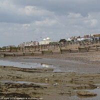 Buy canvas prints of Bexhill Beach at Low Tide by Mark Ward