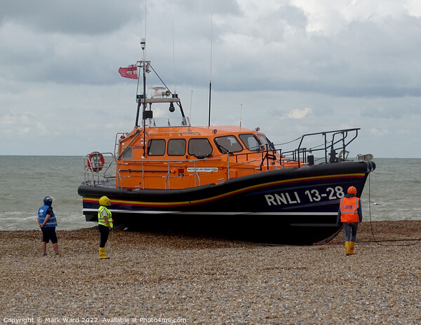 The Hastings lifeboat returning home. Picture Board by Mark Ward