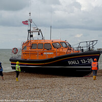 Buy canvas prints of The Hastings lifeboat returning home. by Mark Ward