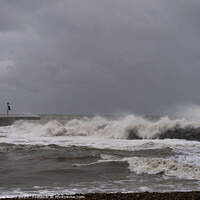 Buy canvas prints of Hastings harbour arm during an Autumn storm. by Mark Ward