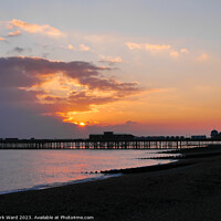 Buy canvas prints of December Sunset over Hastings Pier. by Mark Ward