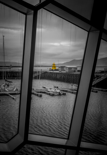 Ingólfsgarður Lighthouse through the Harpa Picture Board by Jonny Gios