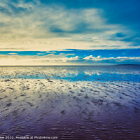 Buy canvas prints of Reflections on the beach  by Jonny Gios
